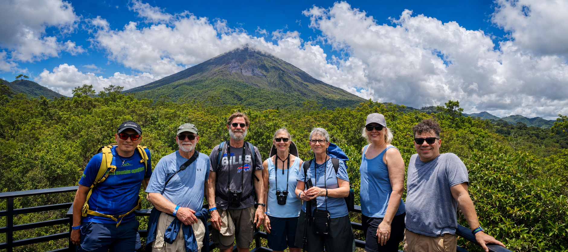 Travelers with a local guide overlooking Arenal Volcano in Costa Rica